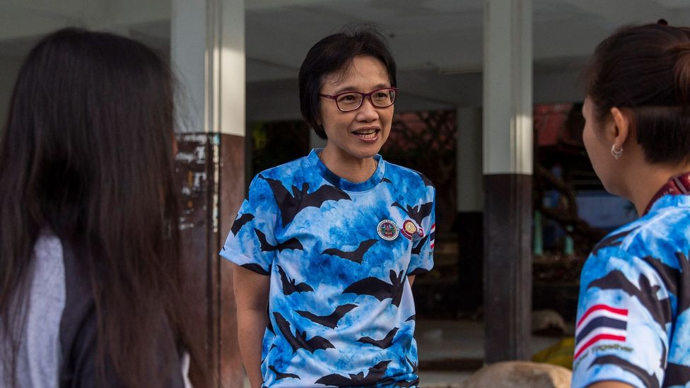 Supaporn Wacharapluesadee speaks with her team, which was the first to confirm a Covid-19 case outside China, on a bat collecting mission in September 2020 (Credit: Getty Images)