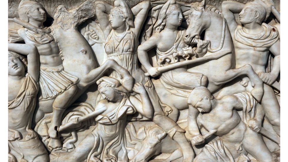 The legendary warrior women – depicted here on an ancient frieze battling the Greeks – became well-known through Greek mythology (Credit: Getty Images)