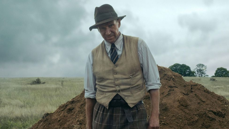 The Dig stars Ralph Fiennes as Basil Brown, the self-taught archaeologist who first made the discovery underneath the mysterious mounds at Sutton Hoo (Credit: Alamy)
