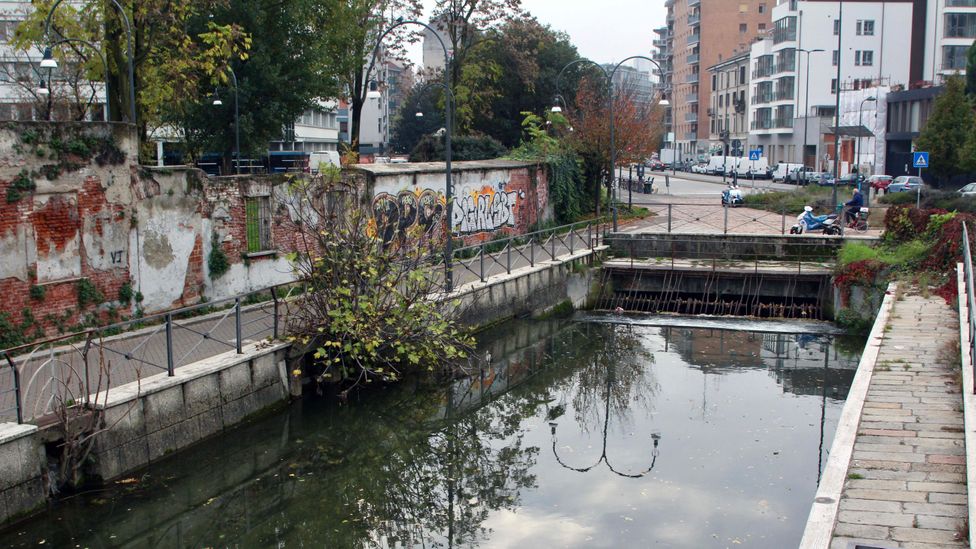 At its end point, the Naviglio Martesana flows beneath the city since the waterways have mostly been covered over by roads and buildings (Credit: Joey Tyson) At its end point, the Naviglio Martesana flows beneath the city since the waterways have mostly been covered over by roads and buildings (Credit: Joey Tyson)