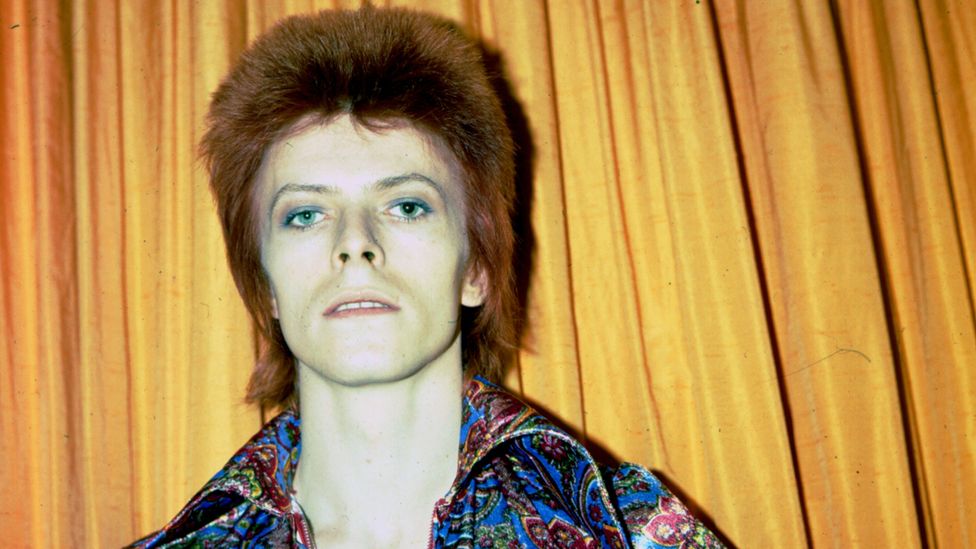 One of David Bowie's most recognisable personas – Ziggy Stardust – sported a glorious scarlet mullet (Credit: Getty Images)