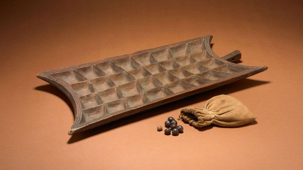 This modern example of a mancala game board comes from Uganda (Credit: The Trustees of the British Museum/ CC BY-NC-SA 4.0)