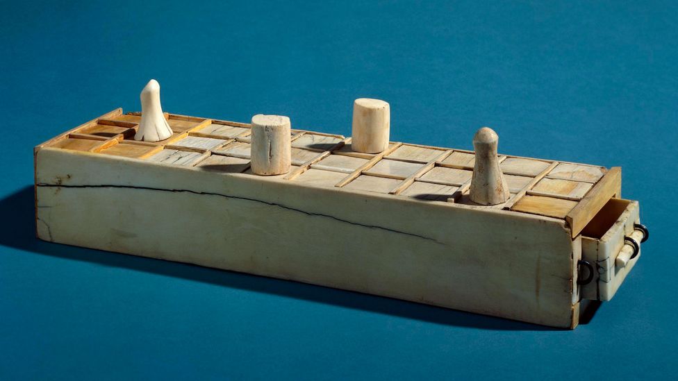 This Egyptian game box from 1400-1200BC has a senet board on top and 20 squares board underneath (Credit: The Trustees of the British Museum/ CC BY-NC-SA 4.0)