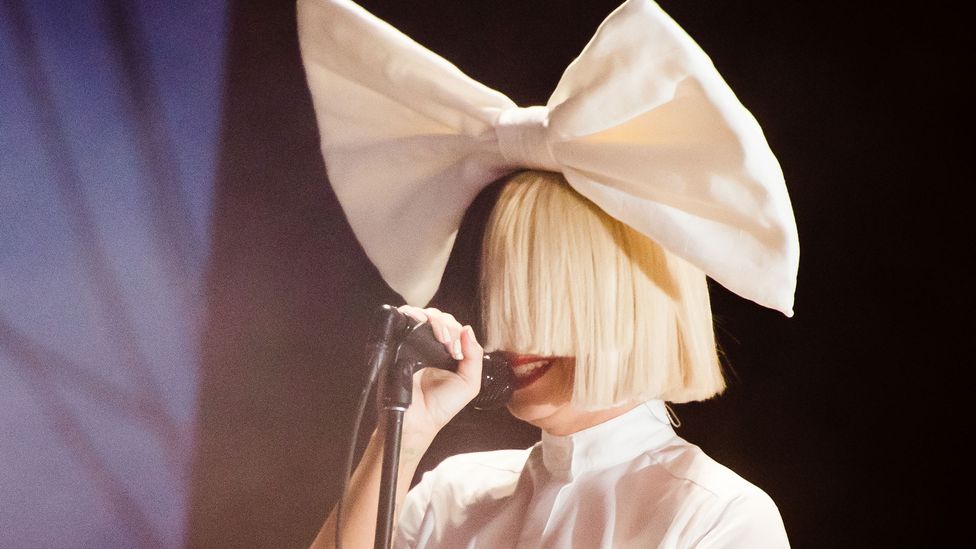 Sia has used an oversized wig to create a certain distance in her public image (Credit: Getty Images) Sia has used an oversized wig to create a certain distance in her public image (Credit: Getty Images)