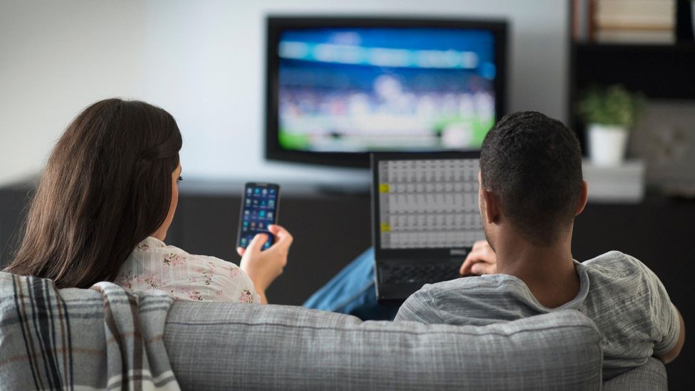 Even after we finish work, we're still hooked to our digital devices during our leisure time (Credit: Alamy)