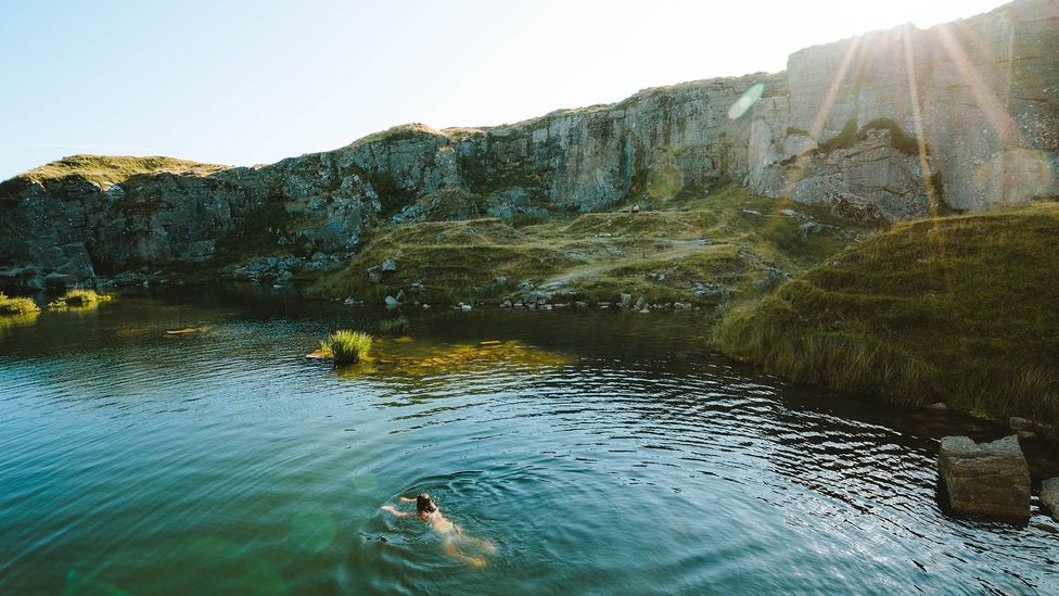 Aside from its health benefits, wild swimming is a great way to explore new sides of the British countryside (Credit: Sam Spicer/Getty Images)