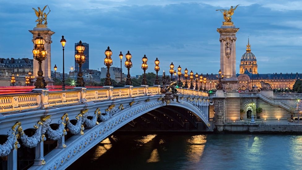 The opulent Pont Alexandre III bridge is undeniably one of Paris' most romantic landmarks (Credit: Guner_Gulyesil/Getty Images)