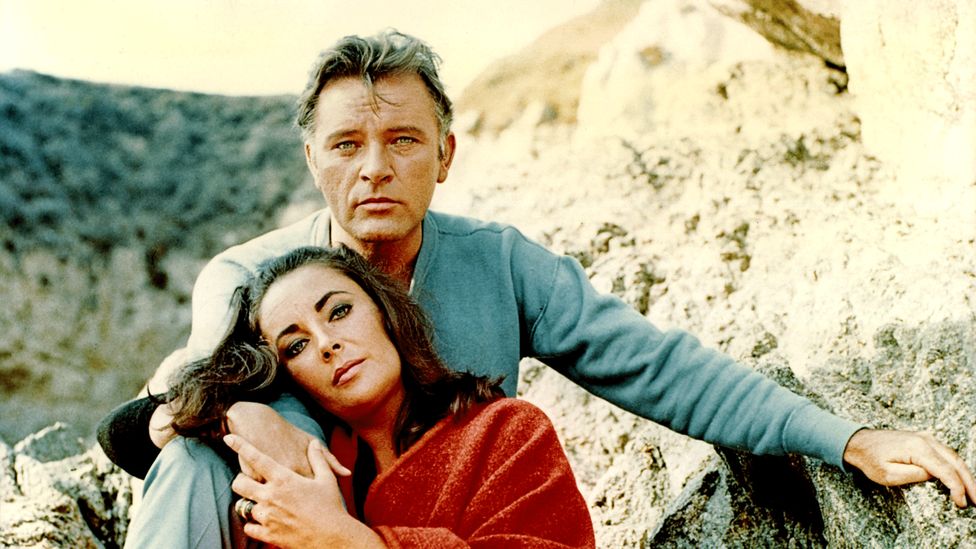 The amour fou and lavish lifestyles of Elizabeth Taylor and Richard Burton made them catnip for the public (Credit: Alamy)