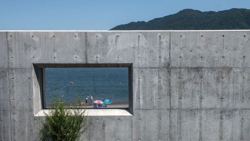 …apart from a rare glimpse. The wall is designed to protect Japan's coast from future tsunamis (Credit: Carl Court/Getty Images)