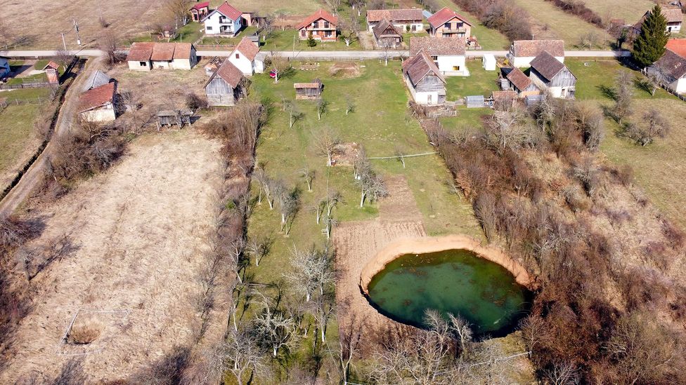The hole in Borojević's garden has continued to grow since it first appeared and could cost hundreds of thousands of Euros to fill in (Credit: AFP/Getty Images)