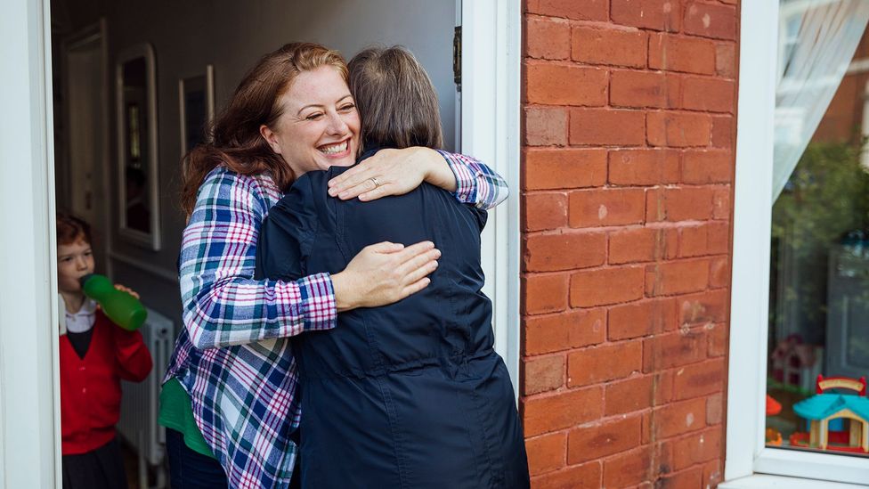 A woman hugging her mum, who was part of her pandemic 'bubble'. Some of us will be more hesitant to leave that bubble in coming months than others (Credit: Getty)