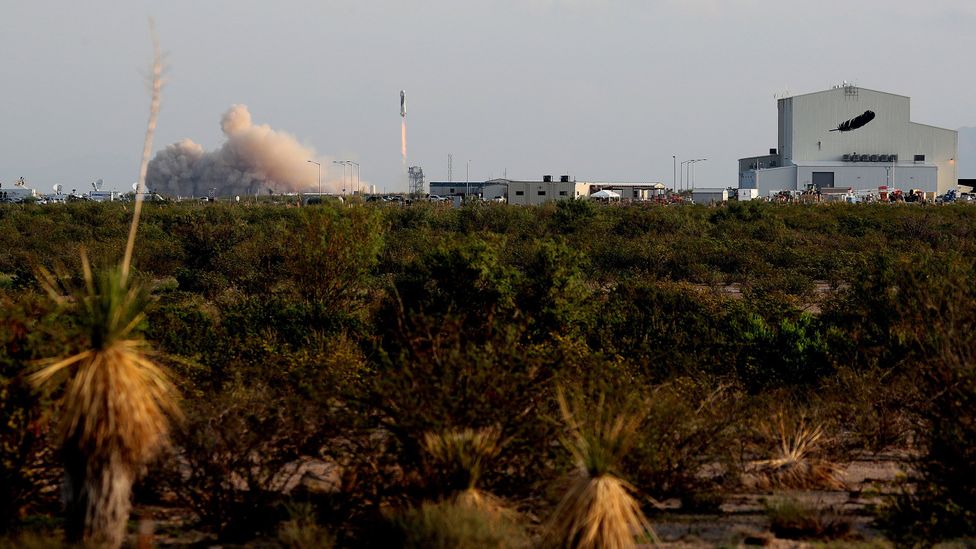 Bezos and passengers lift off, leaving the verdant surface of Earth (Credit: Getty Images) Bezos and passengers lift off, leaving the verdant surface of Earth (Credit: Getty Images)