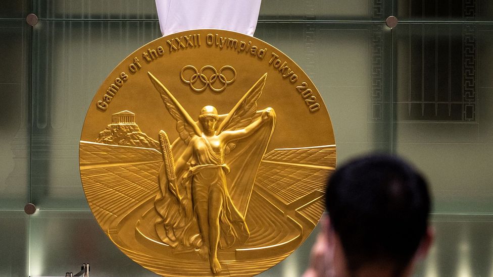 A large scale replica of the Olympic Gold medal (Credit: Philip Fong/AFP/Getty Images)