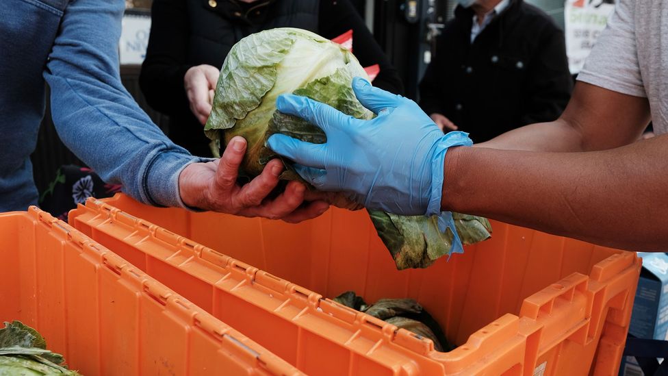 The pandemic has increased levels of food insecurity in many parts of the world causing many people to rely on handouts (Credit: Spencer Platt/Getty Images)
