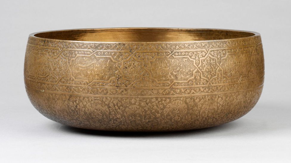 A wine bowl (1510) displays poetry that creates a metaphor from the act of drinking (Credit: Victoria and Albert Museum, London)