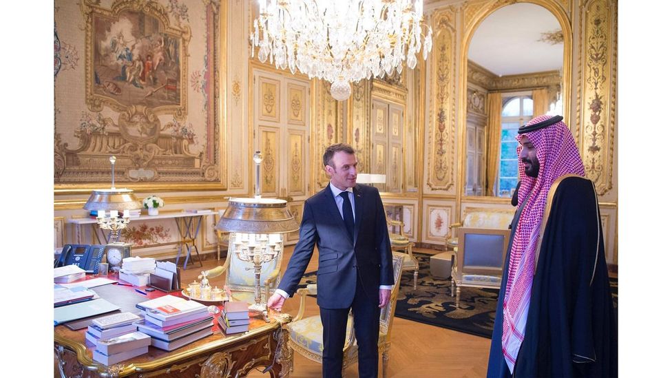 French President Emmanuel Macron pictured in 2018 with the owner of the Leonardo, Crown Prince Mohammad bin Salman (Credit: Photo by Bandar Algaloud/Getty Images)