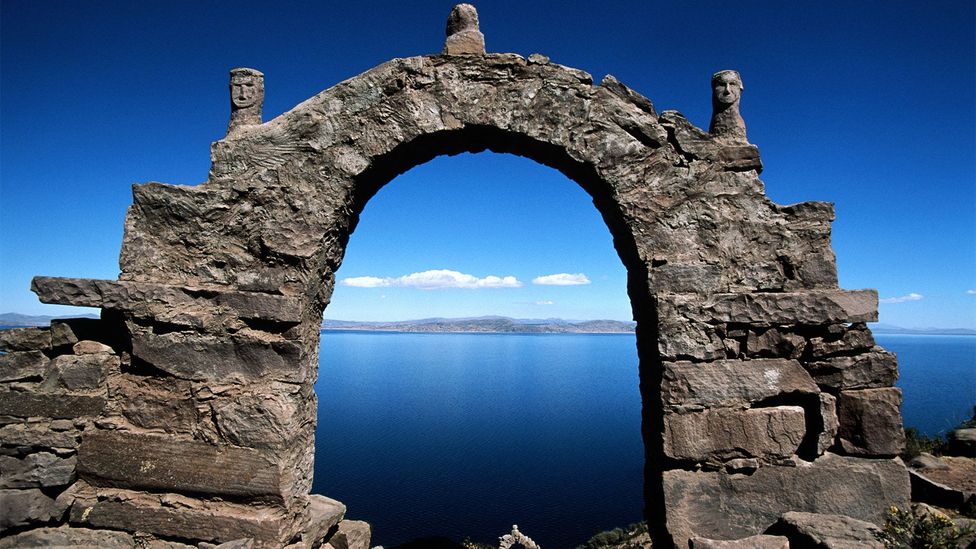 Located in Lake Titicaca, Taquile's long history of isolation has helped preserve its unique culture (Credit: Kevin Schafer/Getty Images)