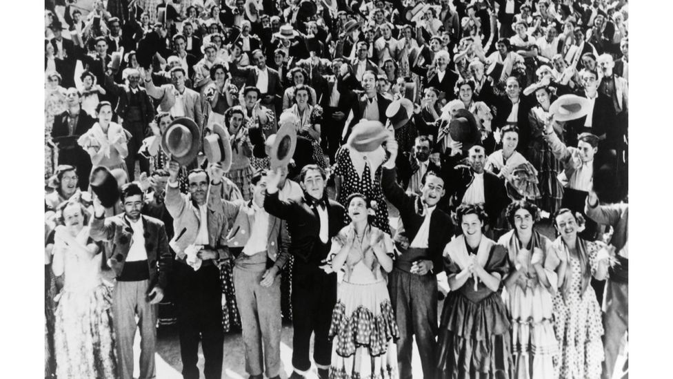 Apparently chaotic crowd scenes, such as in Welcome Mr Marshall, were technically complicated and carefully choreographed (Credit: Alamy)