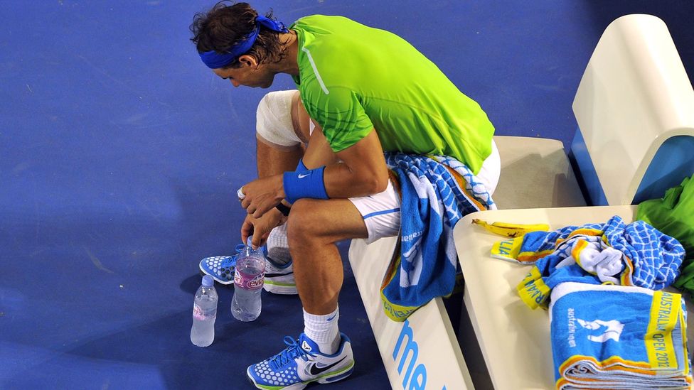 Athletes use rituals for a psychological edge – Rafael Nadal has his energy drink and water in a certain order, for example (Credit: Nicolas Asfouri/AFP/Getty Images)
