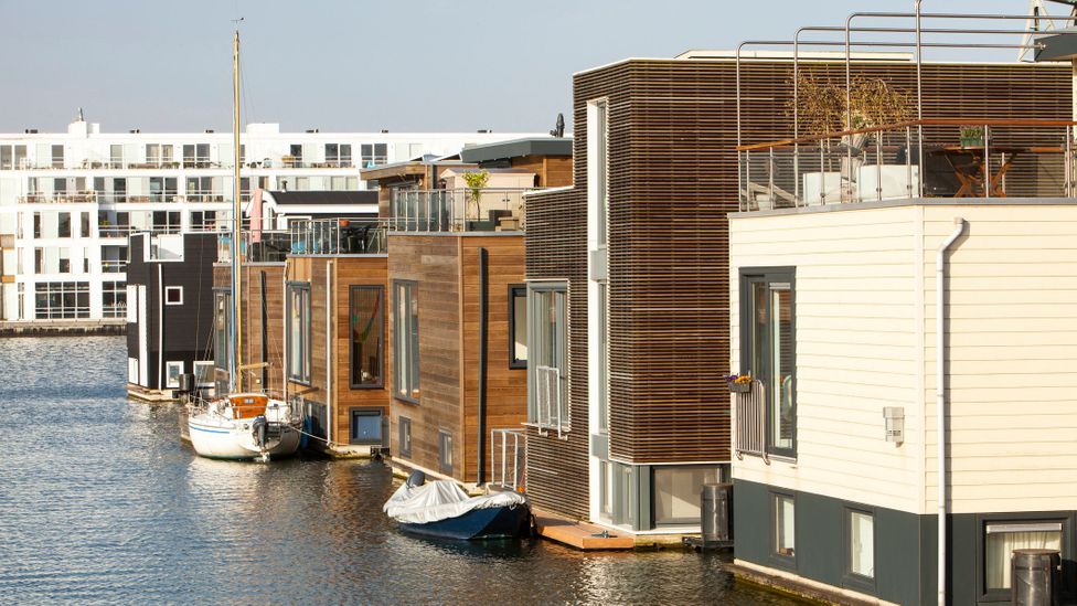 Ijburg, a suburb of Amsterdam, is the floating house capital, with increasing numbers of floating houses being constructed (Credit: Ashley Cooper/Getty Images)