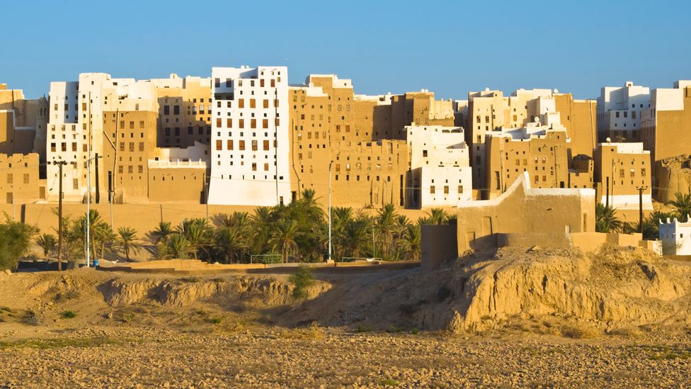 Known as "The Manhattan of the Desert", the 16th-Century walled city of Shibam was given World Heritage status in 1982 (Credit: DavorLovincic/Getty Images)