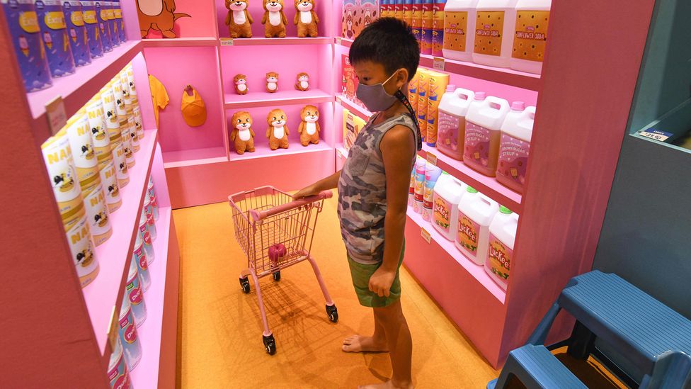In Singapore, it's common for young children to wear masks against Covid – but some parents worry it might affect their development (Credit: Getty Images)
