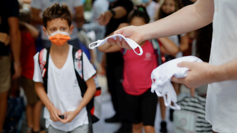 Masks have been shown to help prevent Covid outbreaks, including among children (Credit: Getty Images)