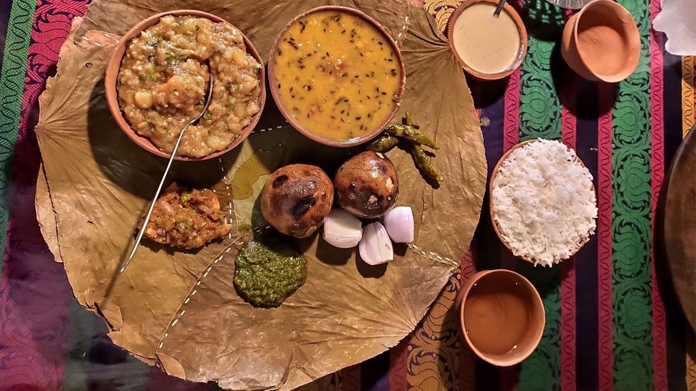 Baati Chokha serves traditional unleavened bread baked on dried cow dung cakes (Credit: Majeet Sahani)