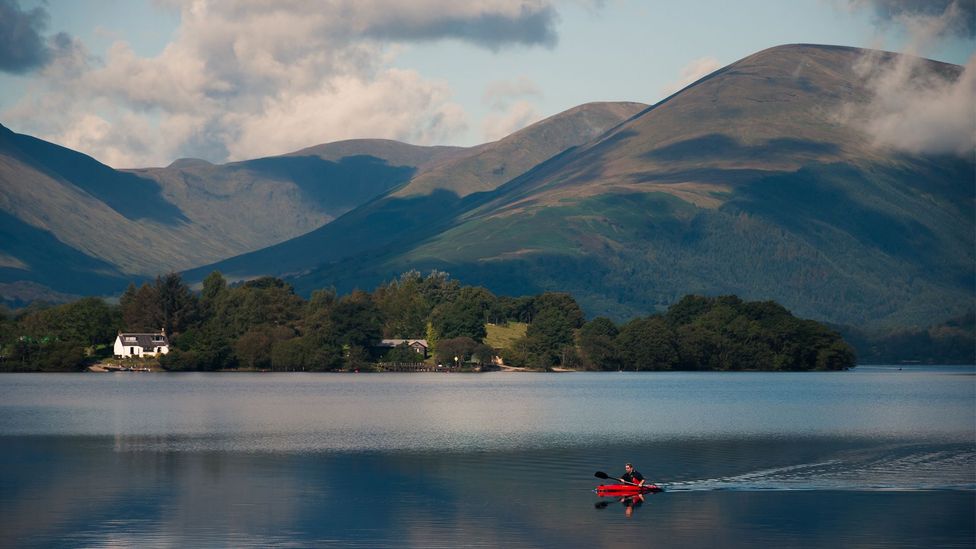 Slow travellers can hire a kayak or canoe to paddle out to the uninhabited isle of Inchconnachan (Credit: Dominic Walter/EyeEm/Getty Images)