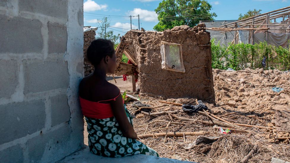 A woman observes the ruins of her house destroyed by cyclone Eloise in the Chinamaconde community of northern Mozambique (Credit: Getty Images)