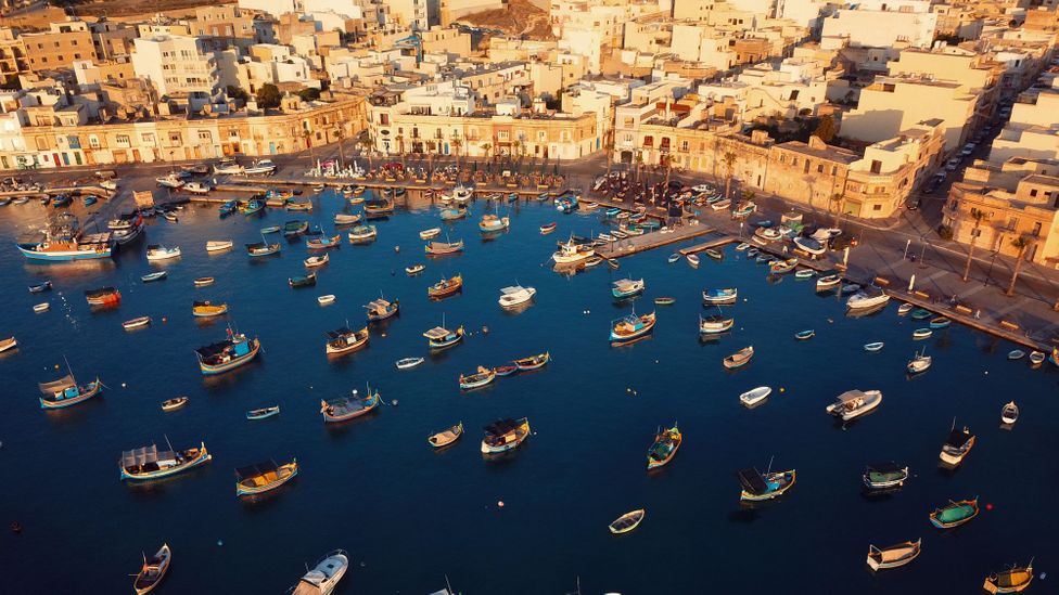 Aerial view of the boats at Marsaxlokk harbour in Malta
