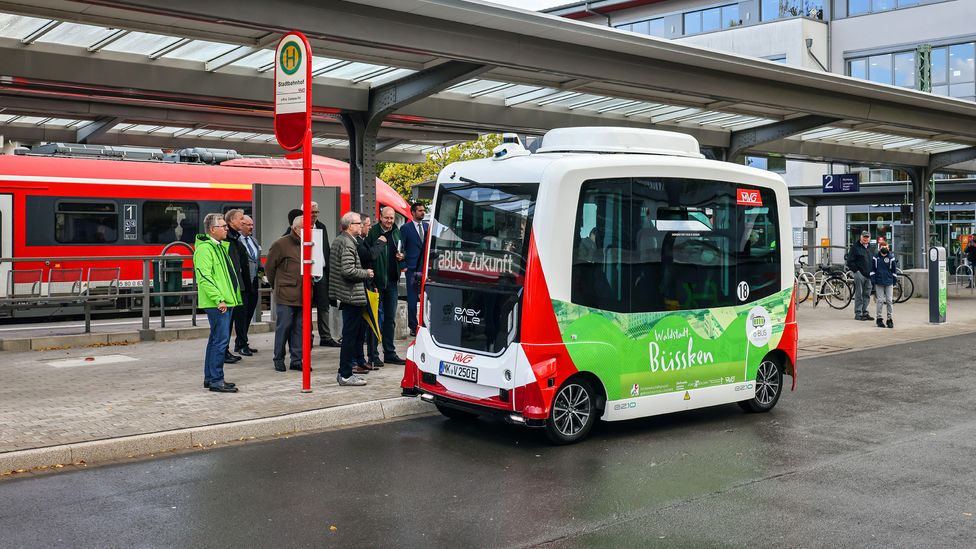Autonomous shuttles, such as these in Iserlohn, Germany, could help to link passengers on public transport to other parts of a city (Credit: Alamy)