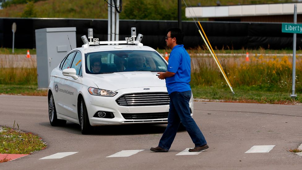 Mcity puts driverless cars through their paces in an environment that mimics a real city, complete with crossing pedestrians (Credit: Jeff Kowalsky/AFP/Getty Images)