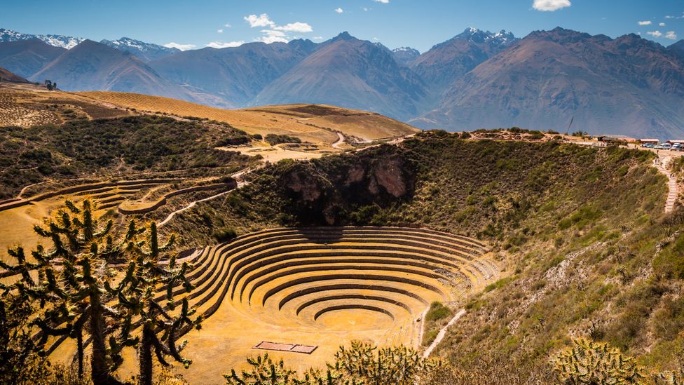 The Incan agricultural site of Moray with mountains in background