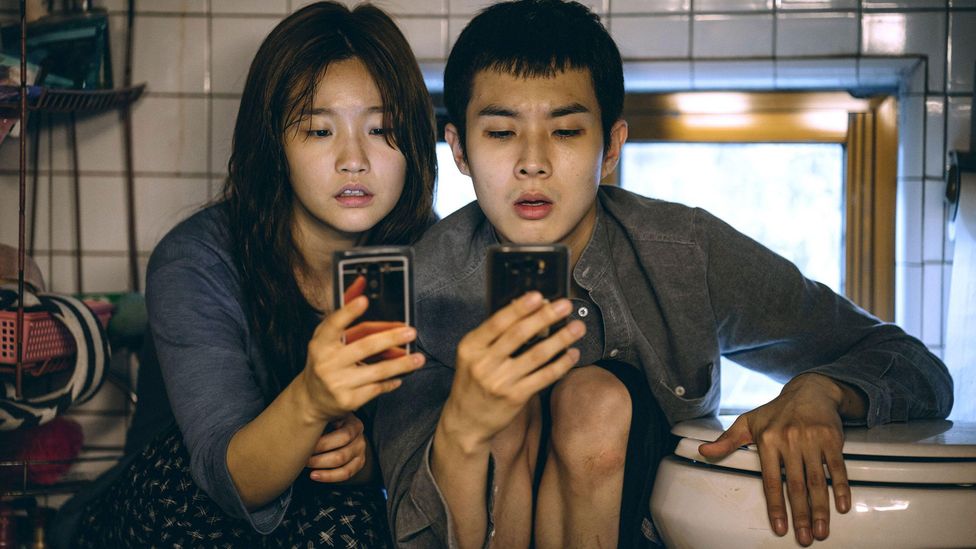 Our increasing use of text on phones has overcome resistance to subtitles and helped non-English language films like Parasite (pictured) to achieve global success (Credit: Alamy)