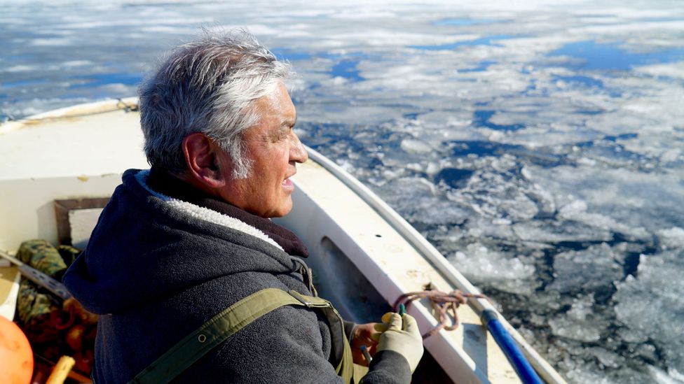 Ross Schaeffer looking out at broken-up ice (Credit: Sarah Betcher, Farthest North Films)