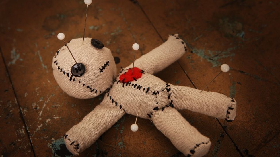 Doll with pins in it