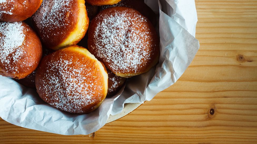 Though doughnuts have become ingrained in American cuisine, they were brought there by European settlers (Credit: Piotr Malcyk/Getty Images)