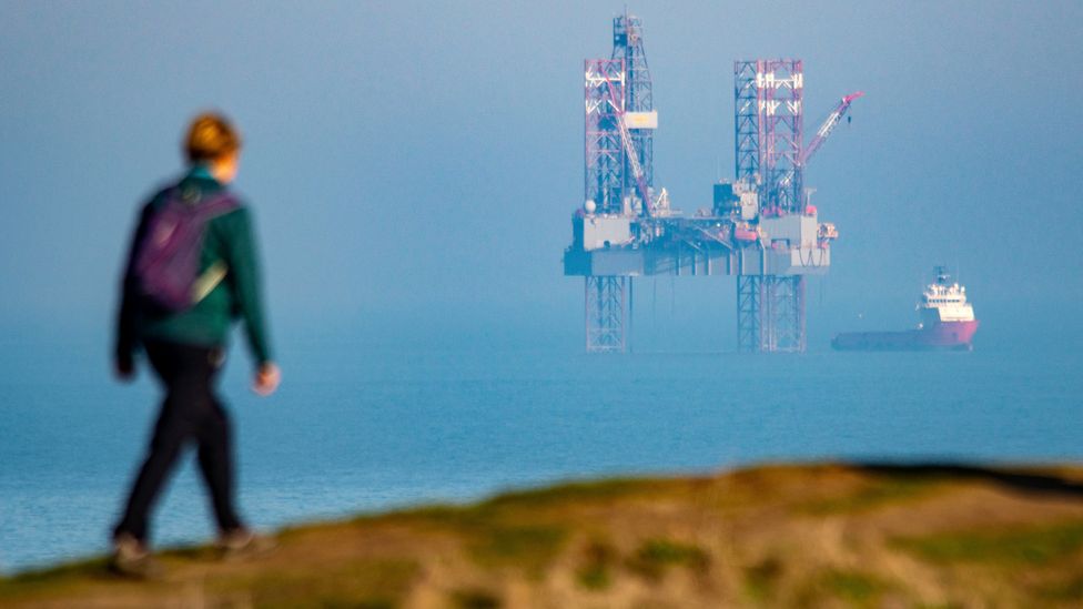 While oil rigs might not seem to qualify as islands, many emerge from the seafloor, sitting on columns taller than skyscrapers (Credit: Getty Images)