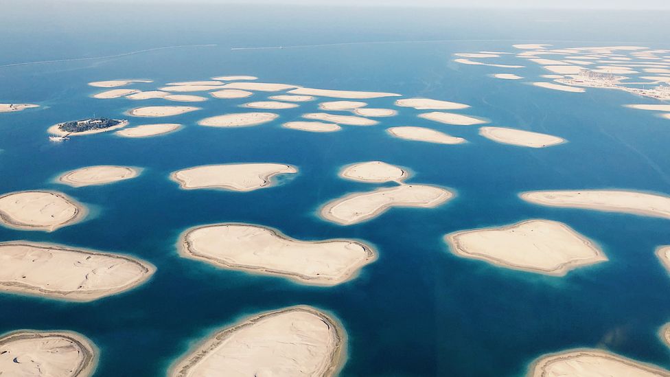 Dubai's map-like The World was intended for the super-wealthy, but many of the islands remain sand, while others are for retail, hotels and apartments (Credit: Getty Images)