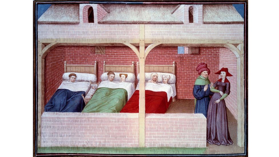 Communal sleeping meant that people usually had someone to chat with when they woke up for "the watch" (Credit: Getty Images)