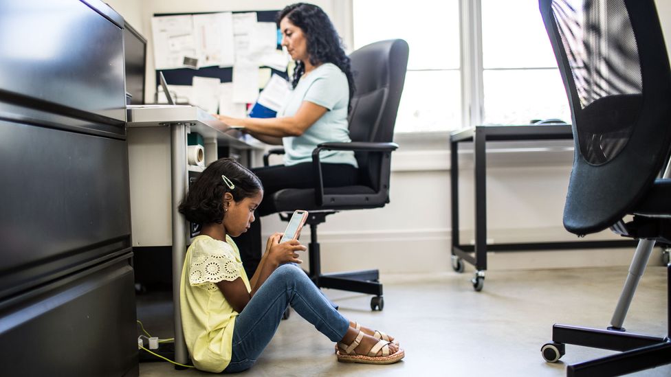 Many parents have had to navigate the balance of home and work life, especially amid the pandemic, which has increased instances of parental shame (Credit: Getty Images)