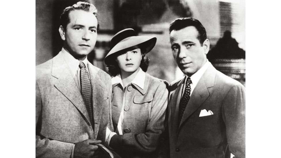 Part of Casablanca's appeal lies in Ilsa (Ingrid Bergman) being torn between Rick (Humphrey Bogart, right) and Victor (Paul Henreid, left) (Credit: Alamy)