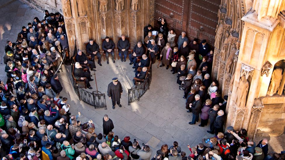 Visitors can watch the meeting of the Tribunal every Thursday at noon outside Valencia Cathedral (Credit: Visit Valencia)