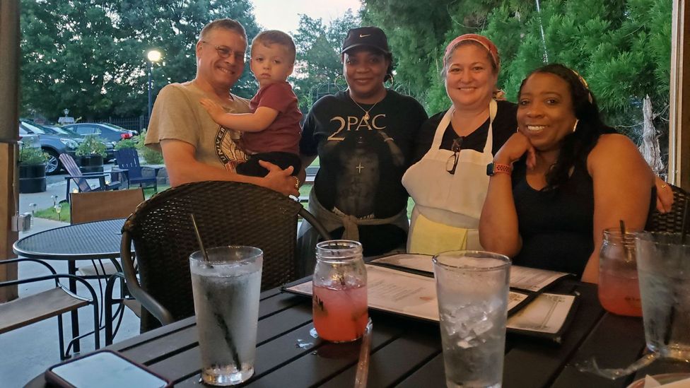 Dixie Benca (second from right) has implemented on-site childcare her restaurant, McGee's Scot-Irish Pub, in South Carolina, US (Credit: Courtesy of Dixie Benca)