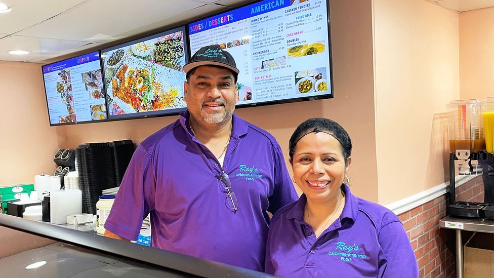 Rayshad Beepath, from Trinidad and Tobago, and his wife Marylena own Ray's Caribbean American Food (Credit: Larry Bleiberg)