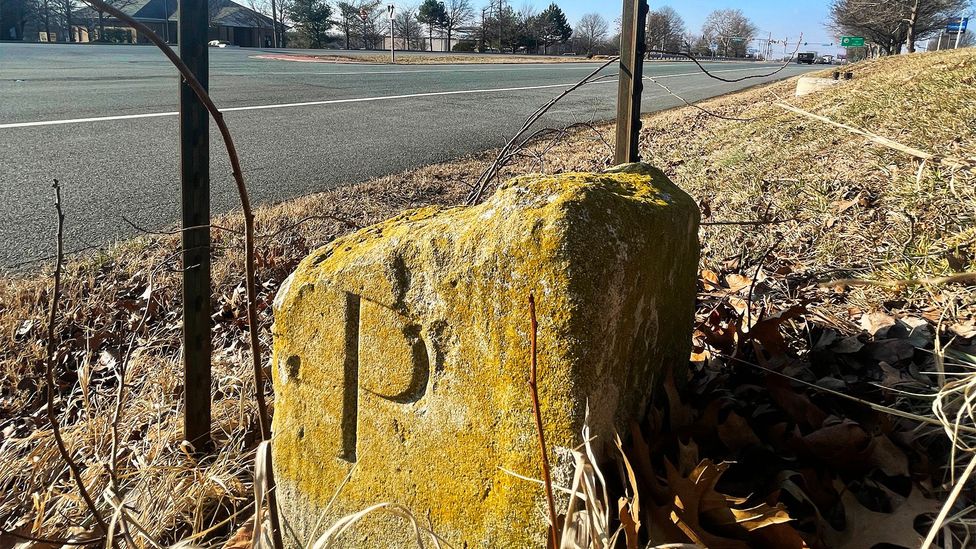 Image copyright Larry Bleiberg Image caption The stone marks the Mason Dixon Line, which divides the north and south of the United States