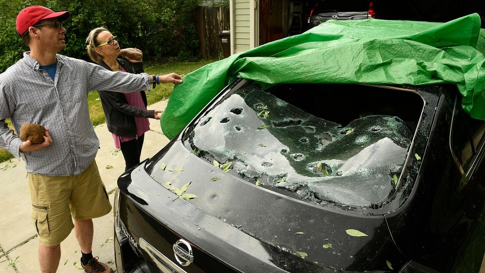 Damage caused by large hail downpours can cause damage to vehicles and buildings costing billions (Credit: Helen H Richardson/The Denver Post/Getty Images)