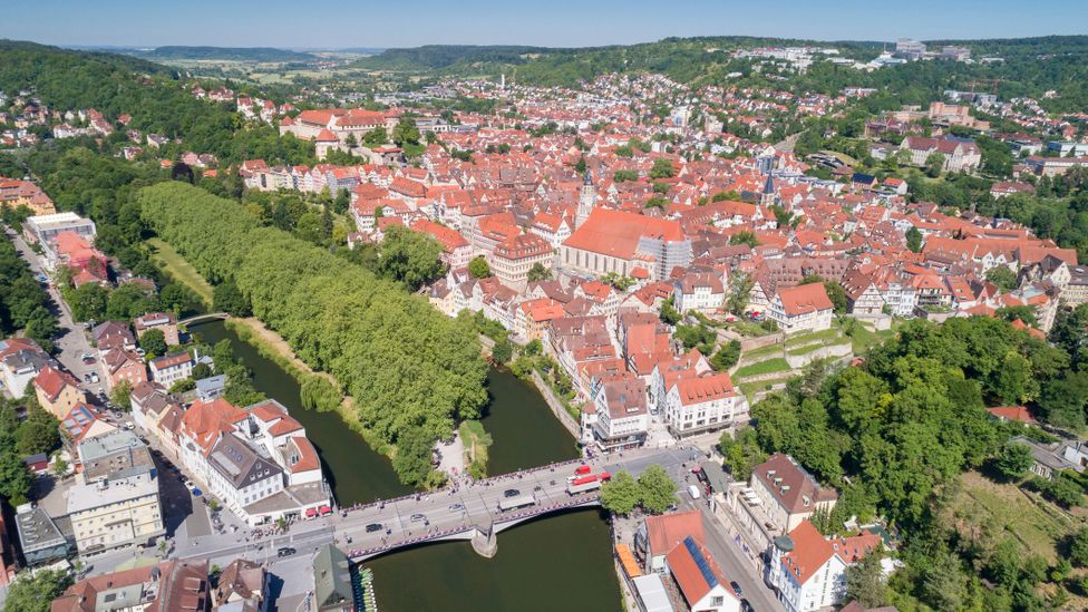 The river Neckar flows through the city centre, forming a little island, the Neckarinsel (Credit: 4FR/Getty Images)