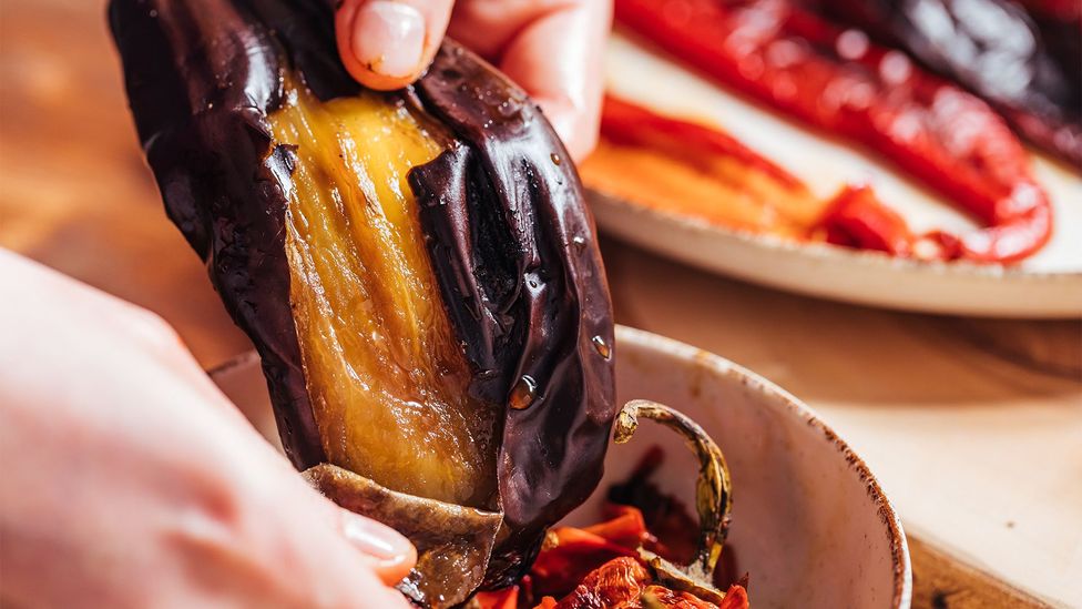 The ajvar vegetables are cooked, peeled and then ground together with the remaining ingredients (Credit: Haris Čalkić)